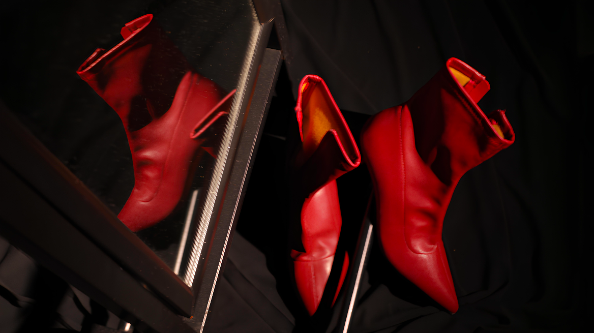 DARE — red boots and reflection